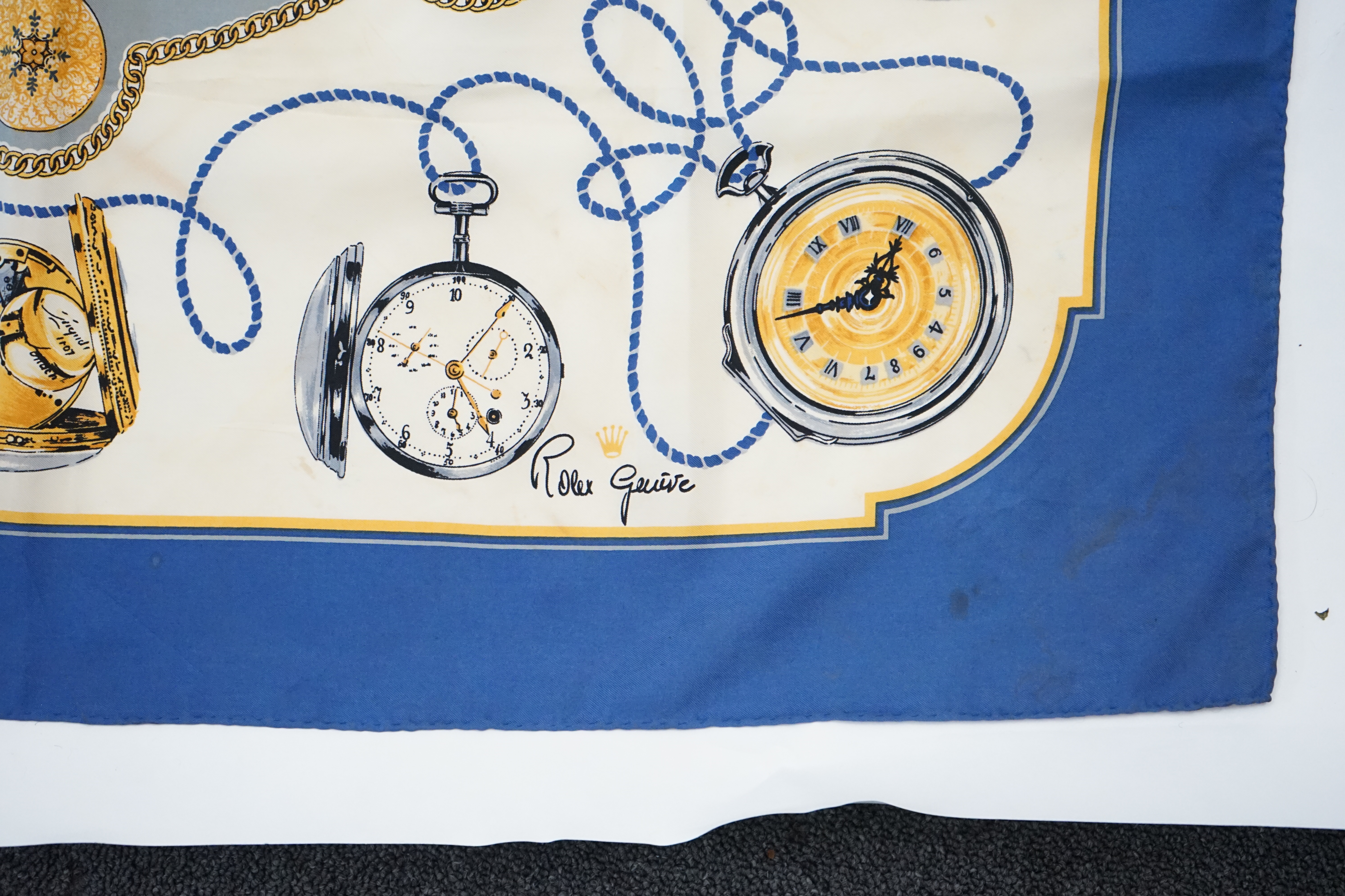 A Rolex blue sapphire statement silk scarf, approx 89cm x 89cm